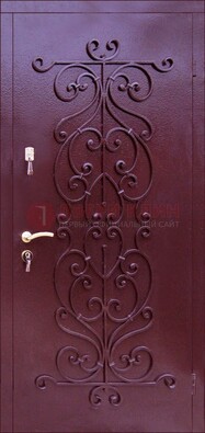 Бордовая металлическая дверь с ковкой ДК-21 в кирпичный дом в Мурино