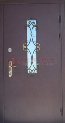 Металлическая дверь со стеклом и ковкой ДСК-77 в панельный дом в Уфе